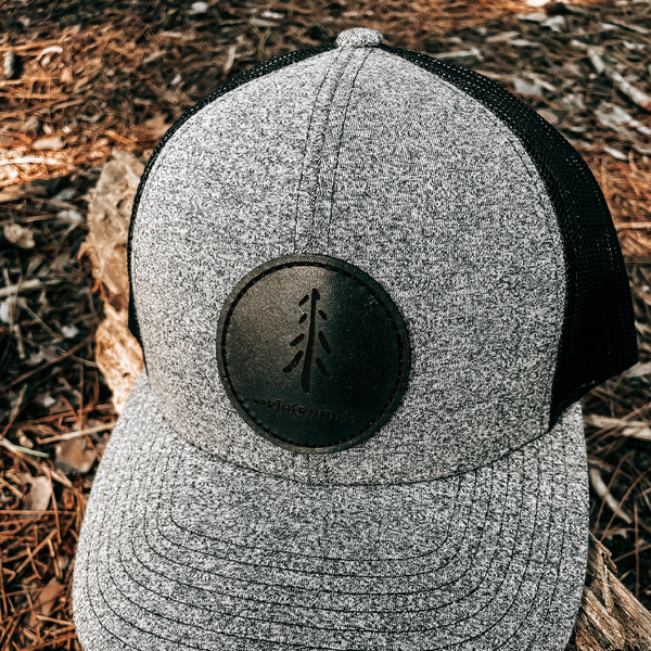 Curved Snapback with Black Leather Patch